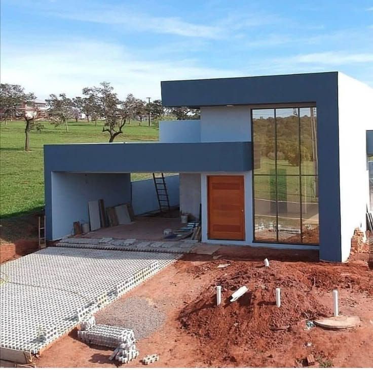 Casa térrea com fachada em azul